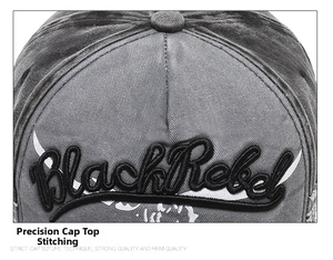 Macro shot of Black Rebel 3D embroidery and washed denim texture on baseball cap