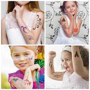 Detail shots of kids wearing colorful temporary Halloween face and body tattoo stickers