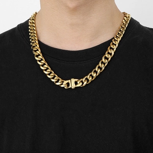 Chunky 13mm gold Cuban link chain necklace for men with rectangular clasp on model
