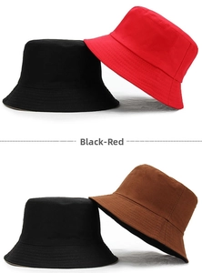Close-up of cotton bucket hats in black, red and brown colors for men and women