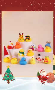 Close-up of assorted Christmas rubber ducks with festive hats and scarfs on stands