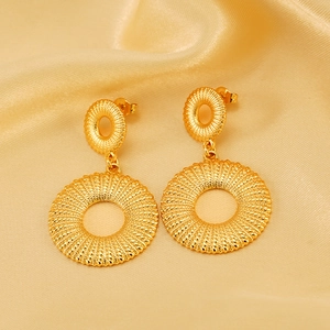 Golden titanium steel double hoop earrings with woven texture on champagne silk background