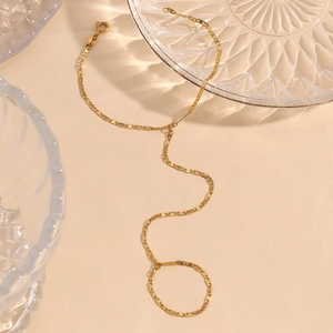 Detailed macro view of 18K gold plated stainless steel finger ring bracelet chain link