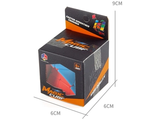 Macro view of pyramid puzzle cube with blue and orange segments in retail box packaging