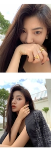 Detail of natural freshwater pearl bead ring and gold engraved signet ring on model