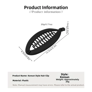 Detailed view of matte black banana hair clip showing its 13.5cm size and curved teeth