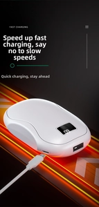Close-up of a white digital power bank with LED battery display and charging ports