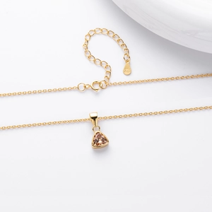 Detailed close-up of S925 sterling silver lobster clasp with 925 engraving and gold plating