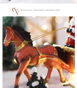 Detailed view of LED horse carriage with Santa Claus model and snowy base decoration