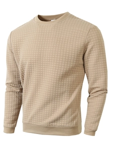 Detailed view of khaki quilted texture and crew neck design on men's long sleeve sweatshirt