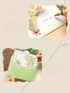 Macro shot of 3D pop-up tulip flower greeting card with elegant Thank You gold lettering