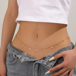 Gold stainless steel waist chain with hollow heart and star pendants on a model
