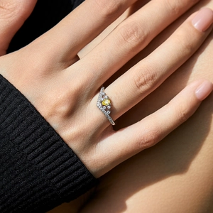 Elegant s925 silver crown ring with water drop yellow diamond and white stones on finger