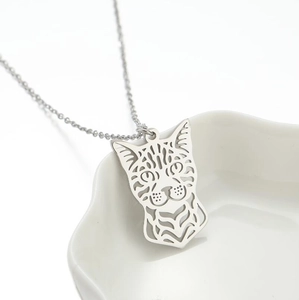 Detail shot of the hollow cat pendant necklace with a fine silver-tone bead chain