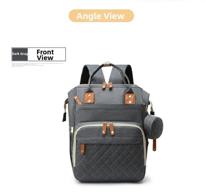 Front view of dark grey quilted diaper backpack with leather accents and coin purse