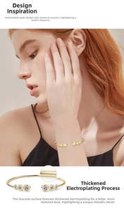 Dettaglio del bracciale rigido in moissanite dorata con placcatura spessa e pietre