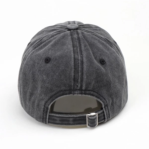 Detail view of the vintage washed cotton baseball cap with adjustable metal back buckle