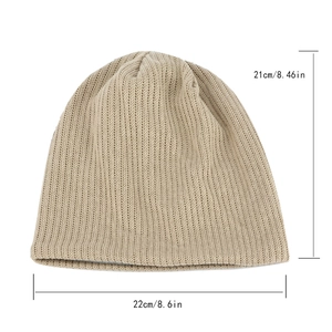 Flat lay of a beige knitted beanie showing size measurements of 21cm by 22cm clearly