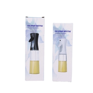 Set of 500ml glass oil spray bottles with black and white nozzles on white background