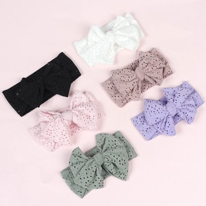 Breathable baby bow headbands in six pastel colors featuring hollow eyelet fabric style