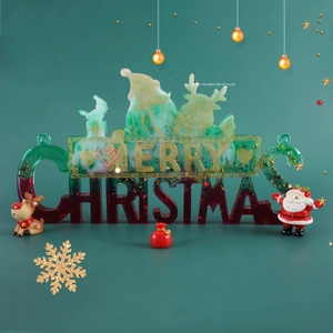 Detail of glittery resin Merry Christmas sign with hook hole and festive elk decor