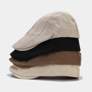 Classic newsboy flat caps in four colors made of textured knit fabric for autumn