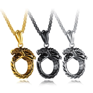 Trois pendentifs dragon punk en acier inoxydable finitions or, noir et argent