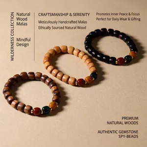 Three premium sandalwood bead bracelets with colorful accents on an open white book