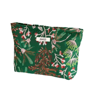 Trousse à maquillage portable vert fleuri pour le rangement des soins de la peau