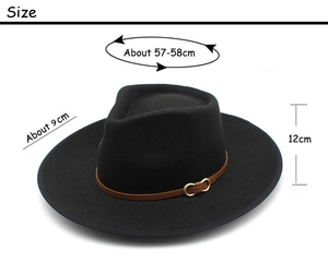 Detailed view of black wool fedora hat with brown leather band and gold buckle details
