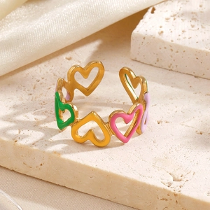 Colorful enamel heart cutout open ring in gold stainless steel on stone base