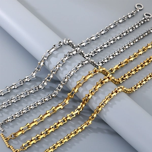 Men's titanium steel bamboo link bracelet with skull OT clasp in gold and silver