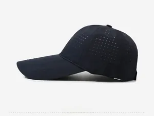 Detail view of quick-drying baseball cap featuring laser-cut ventilation holes and long brim