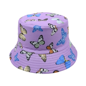 Detail of purple bucket hat with colorful butterfly prints and reinforced brim stitching