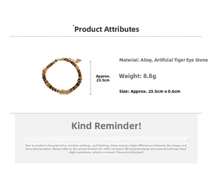 Detail of synthetic tiger eye beads and golden alloy rings on a bohemian bracelet