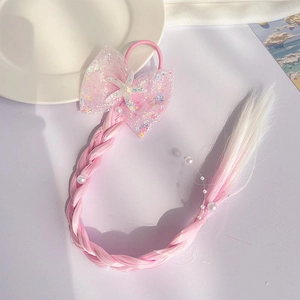 Pink bow hair tie with starfish detail and gradient braided hairpiece for girls