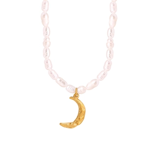 Elegant freshwater pearl necklace with a textured gold moon pendant on white background