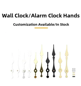 Detail showing decorative metal clock hands in silver, gold, brass and black finishes