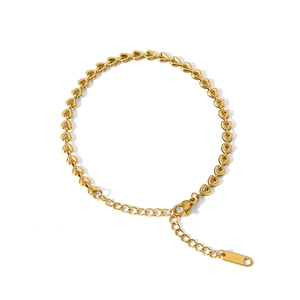 Polished gold stainless steel heart charm bracelet with adjustable chain and lobster clasp