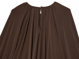 Detail of dark brown blouse featuring pleated neckline and teardrop back closure