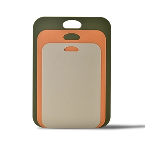 Set of 3 thin plastic cutting boards in green, orange, and beige with non-slip texture
