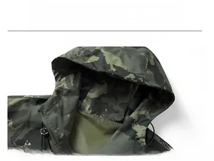 Detail of army green camouflage hooded jacket with adjustable drawstring and metal zipper