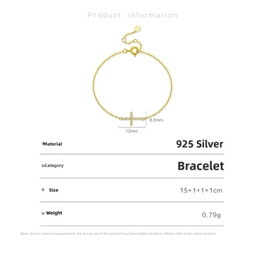 Detail view of gold S925 silver cross bracelet with zirconia and lobster clasp