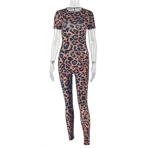 Detailed front view of leopard print short sleeve slim fit jumpsuit for women on model