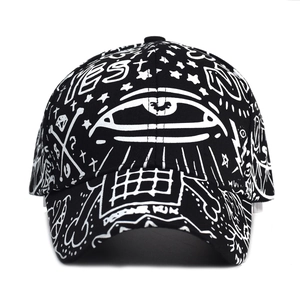 Graffiti print baseball cap in black and white street style with adjustable brim