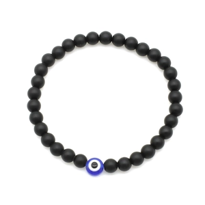 Black 6mm lava stone bracelet with blue evil eye bead on white background