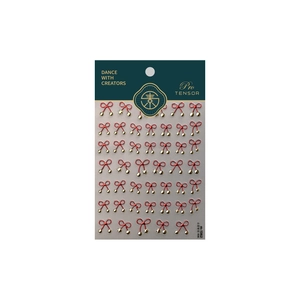 Red bow nail art stickers with gold star accents for American college style manicure