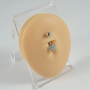 Silver stainless steel belly button ring featuring a heart pendant with clear cubic zirconia