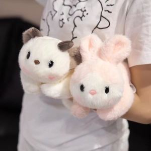 Cute plush stuffed animals including a white cat and pink bunny with soft fluffy texture