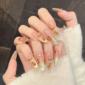 Roze en gouden bloemen plaknagels met strassteentjes in lange amandelvorm-stijl